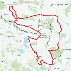 Mapa z zaznaczonym czerwonym szlakiem rowerowym, biegnącym przez tereny z nazwami miejscowości jak Karviná, Jastrzębie-Zdrój. To idealny żelazny szlak rowerowy.