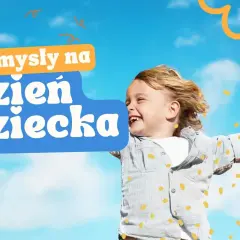 Radosny chłopiec z tekstem "Pomysły na Dzień Dziecka". Szukasz atrakcji dla dzieci w Małopolsce?
