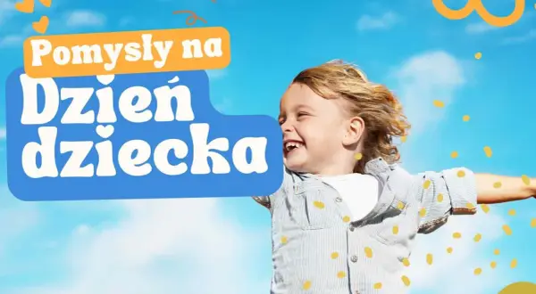 Radosny chłopiec z tekstem "Pomysły na Dzień Dziecka". Szukasz atrakcji dla dzieci w Małopolsce?